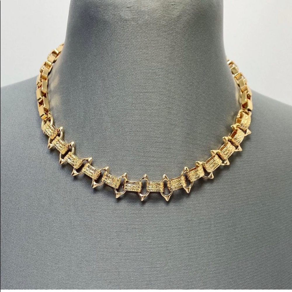 Gold necklace.